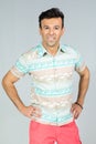 Handsome brazilian male wears colorful summer shirt. 30s.