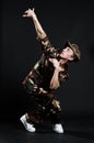 Handsome breakdancer in military uniform Royalty Free Stock Photo