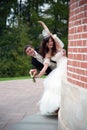 Handsome bride and funny groom