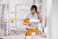 Handsome builder or architect holding a blueprint Royalty Free Stock Photo