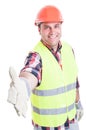 Handsome builder doing hand shake gesture Royalty Free Stock Photo