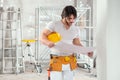 Handsome  builder or supervisor holding a blueprint Royalty Free Stock Photo