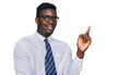 Handsome business black man wearing white shirt and tie smiling happy pointing with hand and finger to the side Royalty Free Stock Photo