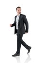 Handsome business man go walk making step, businessman wear elegant black suit. Isolated over white background. The concept of hi- Royalty Free Stock Photo