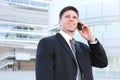 Handsome Business Man at Office on Phone Royalty Free Stock Photo