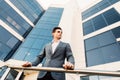 Handsome business man outdoors in front of business center look forward Royalty Free Stock Photo