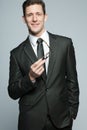 Handsome businessman in black suit. Royalty Free Stock Photo