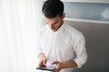 Handsome businessman doing some notices in the offic. Business and people concept Royalty Free Stock Photo