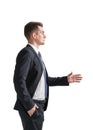 Handsome Businessman in formal suit holds out his hand for a handshake Royalty Free Stock Photo
