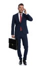 Businessman happy to close a deal over the phone Royalty Free Stock Photo