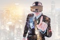 Handsome businessman pointing with finger and wearing VR headset Royalty Free Stock Photo