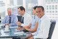 Handsome businessman posing in the meeting room Royalty Free Stock Photo