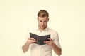 Handsome businessman reading book. Businessman read book for self improvement. Looking interesting idea. Reading