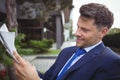 Handsome businessman reading newspaper Royalty Free Stock Photo