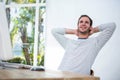 Handsome businessman relaxing on his desk chair Royalty Free Stock Photo