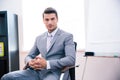 Handsome businessman sitting on the office chair Royalty Free Stock Photo