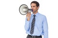 Handsome businessman talking through megaphone