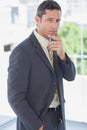 Handsome businessman thinking Royalty Free Stock Photo
