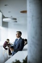 Handsome businessman using his tablet in the office Royalty Free Stock Photo