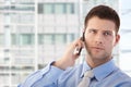 Handsome businessman using mobile phone Royalty Free Stock Photo