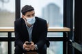 Handsome businessman wear masks protect against airborne disease and salivary infections.