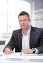 Handsome businessman working at desk Royalty Free Stock Photo