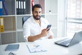 Handsome Businessman Working on Laptop at His Office Royalty Free Stock Photo