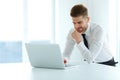 Handsome Businessman Working on Laptop at His Office Royalty Free Stock Photo