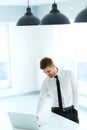 Handsome Businessman Working on Laptop at His Office Royalty Free Stock Photo