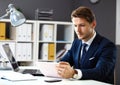 Handsome businessman working with laptop Royalty Free Stock Photo