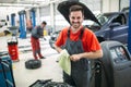 Car mechanic working at automotive service center Royalty Free Stock Photo