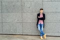 Handsome casual young man in plaid shirt and jacket posing Royalty Free Stock Photo