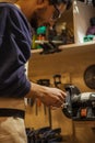 Handsome caucasian carpenter man work using machine for wood cutting Royalty Free Stock Photo