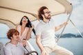 Young friends sailing in caribbean sea