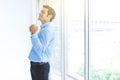 Handsome Caucasian young businessman successful show arms up celebrating his victory. Happy smile in the office Royalty Free Stock Photo