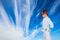 Handsome charming boy in a white kimono