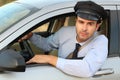 Handsome chauffeur looking at camera Royalty Free Stock Photo