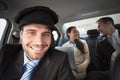 Handsome chauffeur smiling at camera Royalty Free Stock Photo