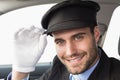 Handsome chauffeur smiling at camera Royalty Free Stock Photo