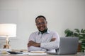 Handsome cheerful african american executive business man at the workspace office Royalty Free Stock Photo