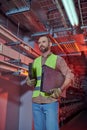 handsome concentrated man in safety vest