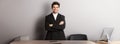 Handsome and confident bearded man, standing in formal suit with hands crossed on chest, smiling satisfied with work