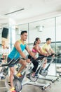 handsome and confident young man during group class of HIIT indo Royalty Free Stock Photo