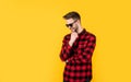 Handsome confident young man standing in shirt and glasses. happy guy smiling. portrait of fashionable handsome man in Royalty Free Stock Photo