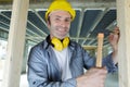 handsome construction man using hammer Royalty Free Stock Photo