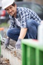 handsome construction worker laying foundations Royalty Free Stock Photo