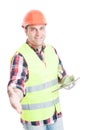 Handsome constructor doing a handshake gesture Royalty Free Stock Photo