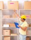 Handsome contractor working in box delivery relocation service Royalty Free Stock Photo