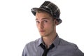 Handsome, cool, confident young man wearing fedora hat Royalty Free Stock Photo