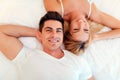 Handsome couple in bed being sensual Royalty Free Stock Photo